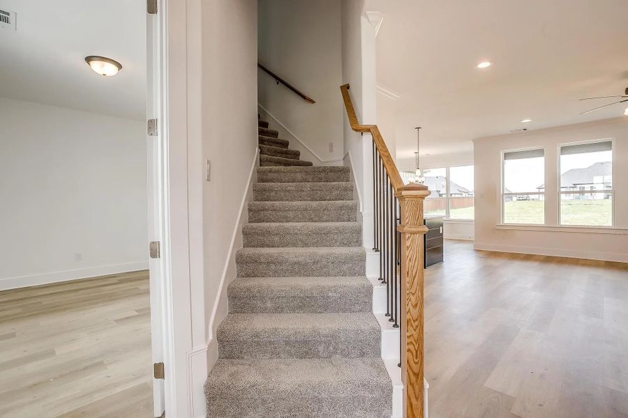 Representative unfurnished interior of a home built from the The Brazos by Elmwood Custom Homes in Matthews Farm, Venus (Image 22). Representative unfurnished interior of a home built from the The Brazos by Elmwood Custom Homes in Matthews Farm, Venus (Image 22).