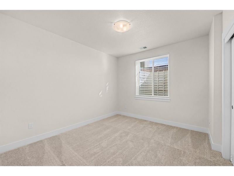 Spacious, unfurnished interior of a new home in The Lakes at Centerra - The Shores, Loveland (Image 18).