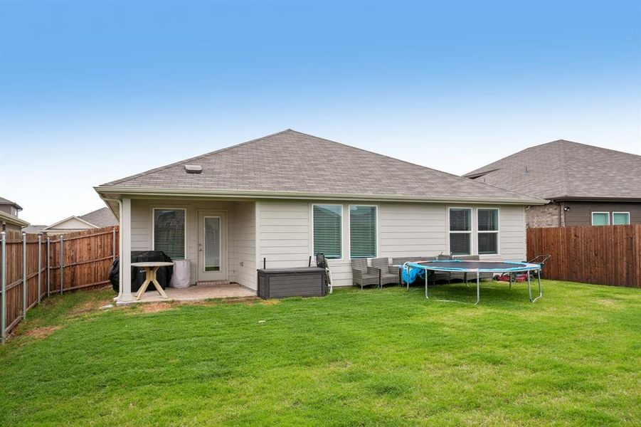 Exterior details and patio area of a home in Frontier Pointe, Princeton (Image 3).