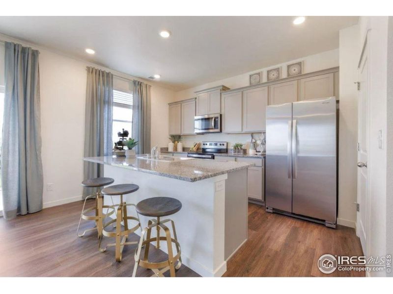 Furnished interior view inside a new home in Fossil Creek Ranch, Windsor (Image 8).