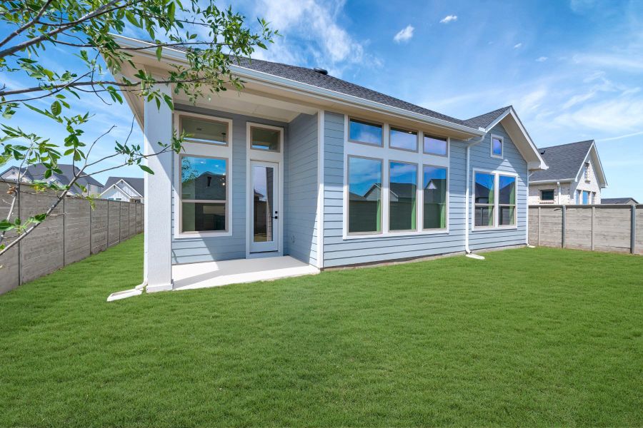 Exterior details and patio area of a home in Treeline, Justin (Image 3). Exterior details and patio area of a home in Treeline, Justin (Image 3).