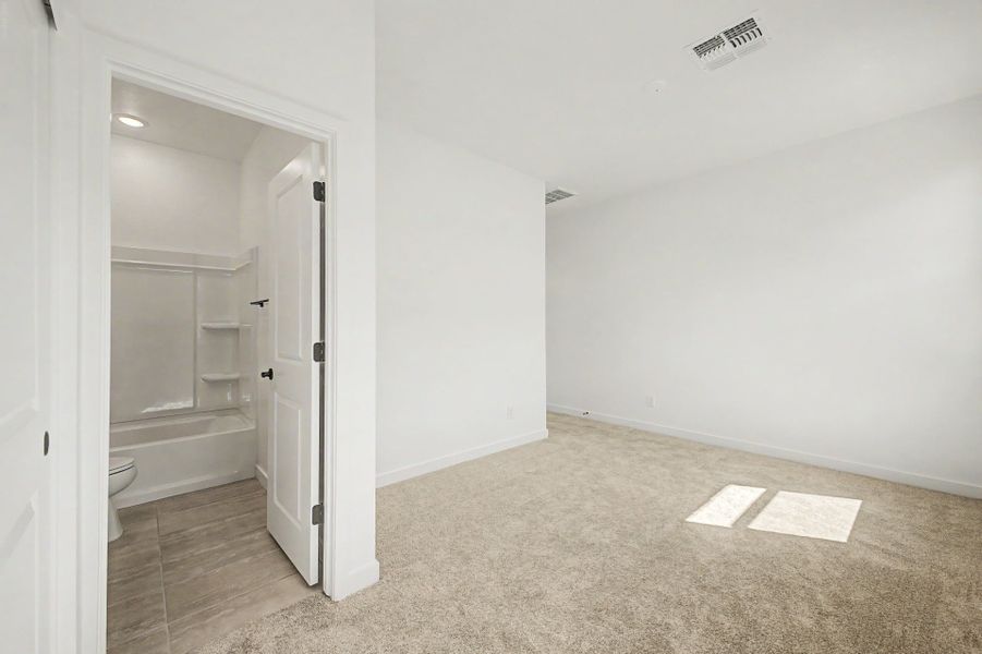 Spacious, unfurnished interior of a new home in The Villages at North Copper Canyon, Surprise (Image 11).