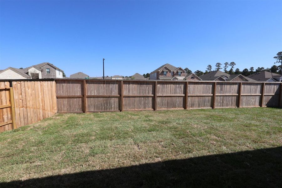 Exterior details and patio area of a home in Moran Ranch, Willis (Image 2). Exterior details and patio area of a home in Moran Ranch, Willis (Image 2).