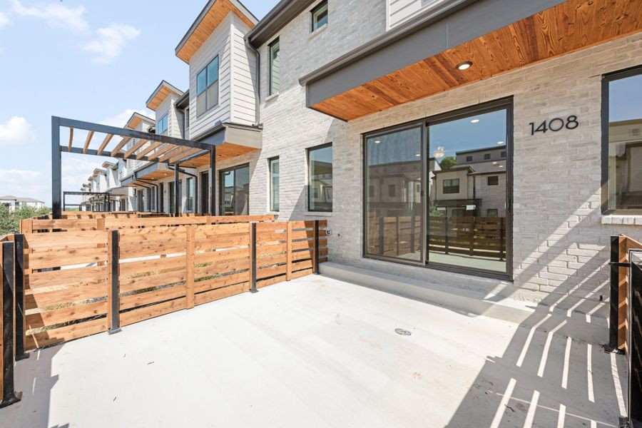 Exterior details and patio area of a home in Willow Grove Townhomes, Melissa (Image 3).