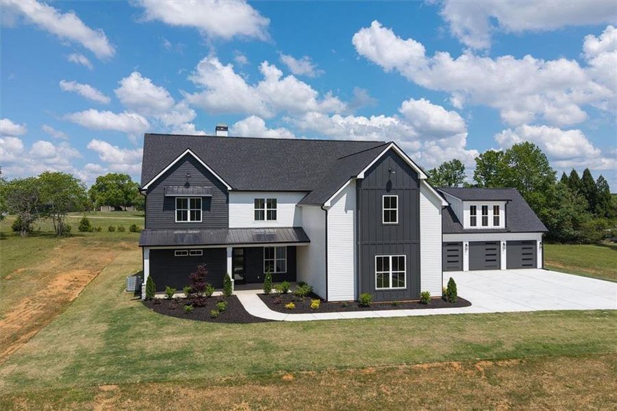 Front exterior of a new home in , Carrollton, GA, highlighting curb appeal (Image 26). Front exterior of a new home in , Carrollton, GA, highlighting curb appeal (Image 26).