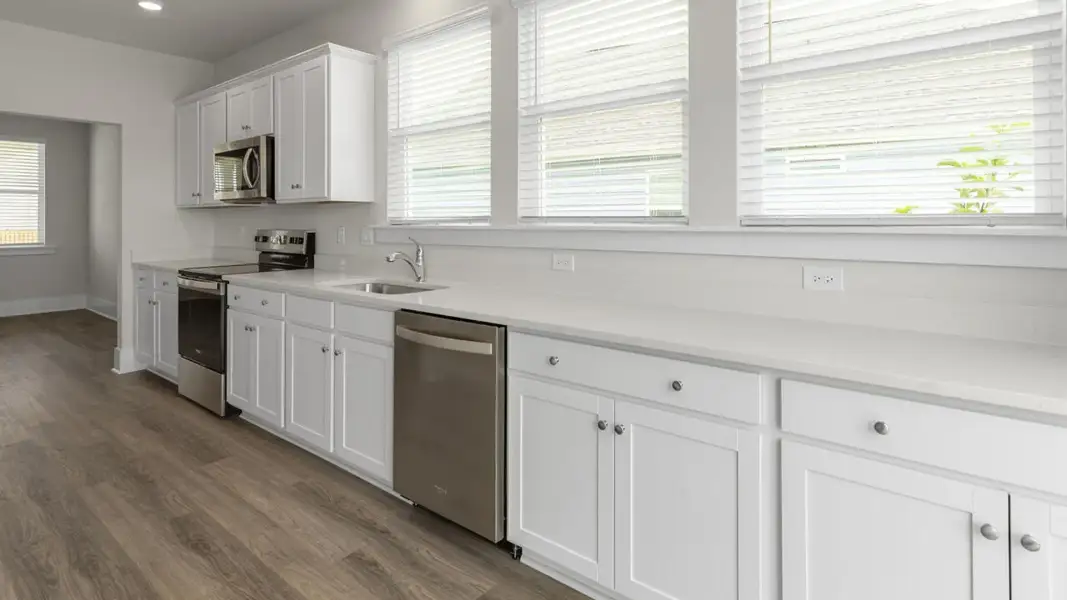 Furnished interior view inside a new home in The Highlands at Cedar Hill Landing, Navassa (Image 9).