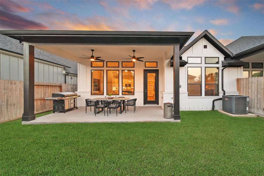 Exterior details and patio area of a home in The Highlands: Highland Duets, Porter (Image 20). Exterior details and patio area of a home in The Highlands: Highland Duets, Porter (Image 20).