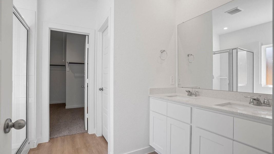 Furnished interior view inside a new home in Caldwell Crossing, Iowa Colony (Image 6).