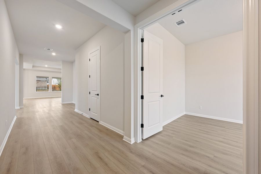 Representative unfurnished interior of a home built from the Carolina by Ashton Woods in The Estates at La Cima, San Marcos (Image 23). Representative unfurnished interior of a home built from the Carolina by Ashton Woods in The Estates at La Cima, San Marcos (Image 23).
