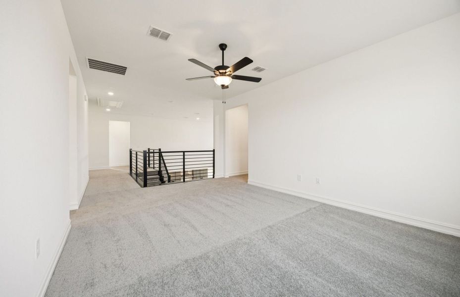 Representative unfurnished interior of a home built from the Ferris by Pulte Homes in Highland Lakes, McKinney (Image 17).