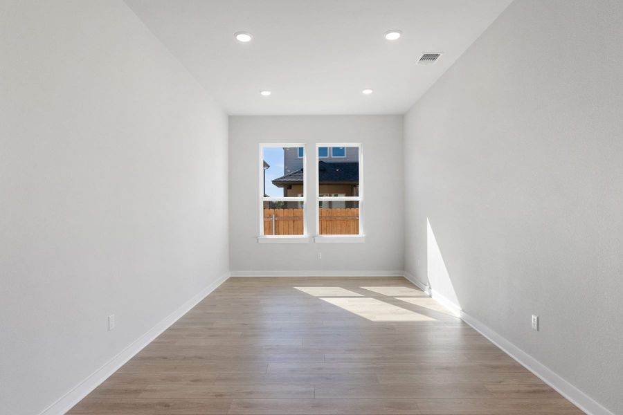 Spacious, unfurnished interior of a new home in Heritage, Dripping Springs (Image 36).