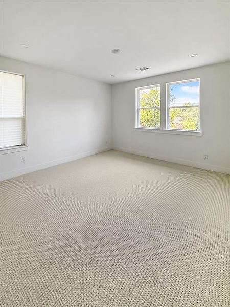 Spare room with baseboards and recessed lighting Spare room with baseboards and recessed lighting