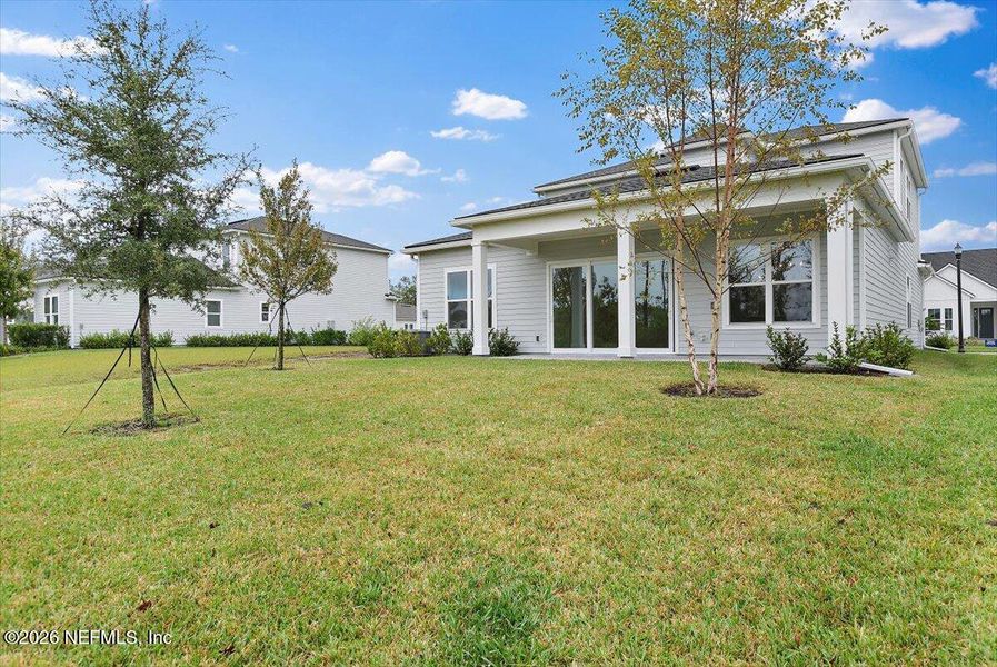 Exterior details and patio area of a home in , Palm Coast (Image 3). Exterior details and patio area of a home in , Palm Coast (Image 3).