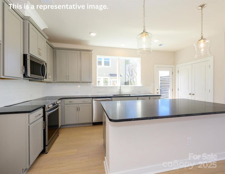 Furnished interior view inside a new home in Central Living at Craig, Charlotte (Image 5).