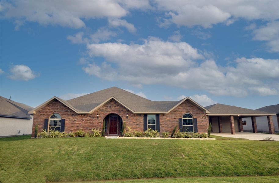 Front exterior of a new home in Pedregal, League City, TX, highlighting curb appeal (Image 25). Front exterior of a new home in Pedregal, League City, TX, highlighting curb appeal (Image 25).