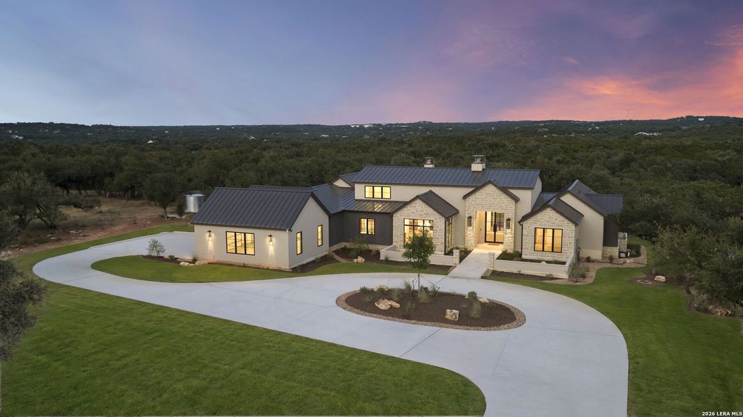 Front exterior of a new home in , Spring Branch, TX, highlighting curb appeal (Image 25).
