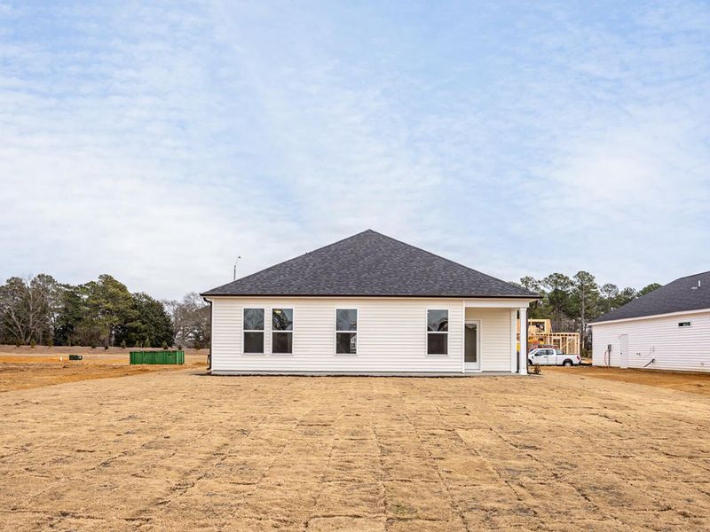 Exterior details and patio area of a home in Retreat at North Main, Lillington (Image 2).