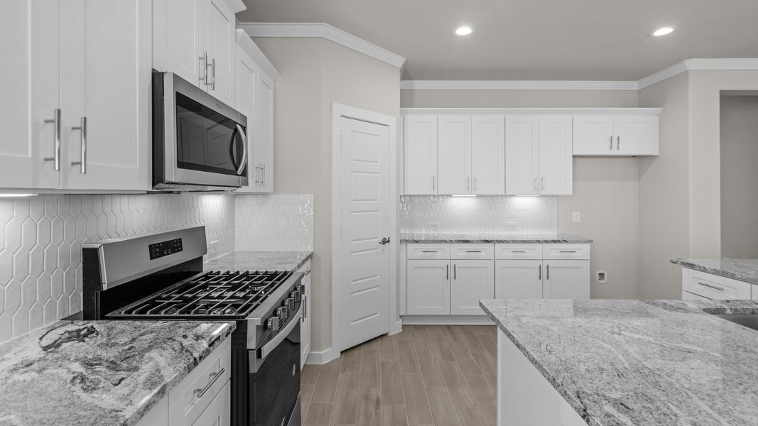 Representative furnished interior of a home built from the LAKEMONT by D.R. Horton in Northwest Passage, Midland (Image 5). Representative furnished interior of a home built from the LAKEMONT by D.R. Horton in Northwest Passage, Midland (Image 5).