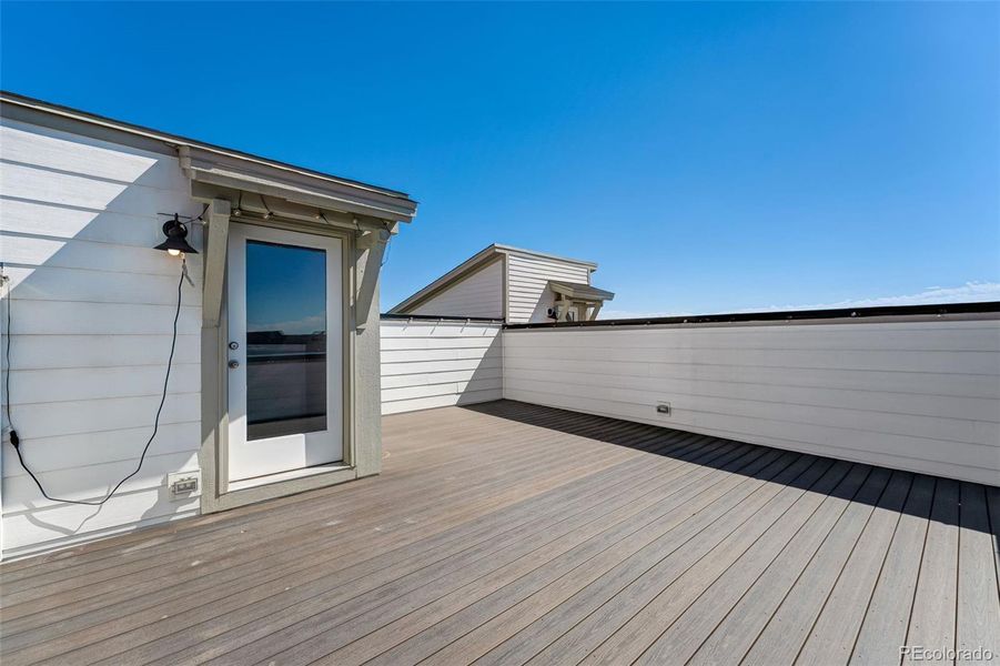 Front exterior of a new home in , Broomfield, CO, highlighting curb appeal (Image 22).