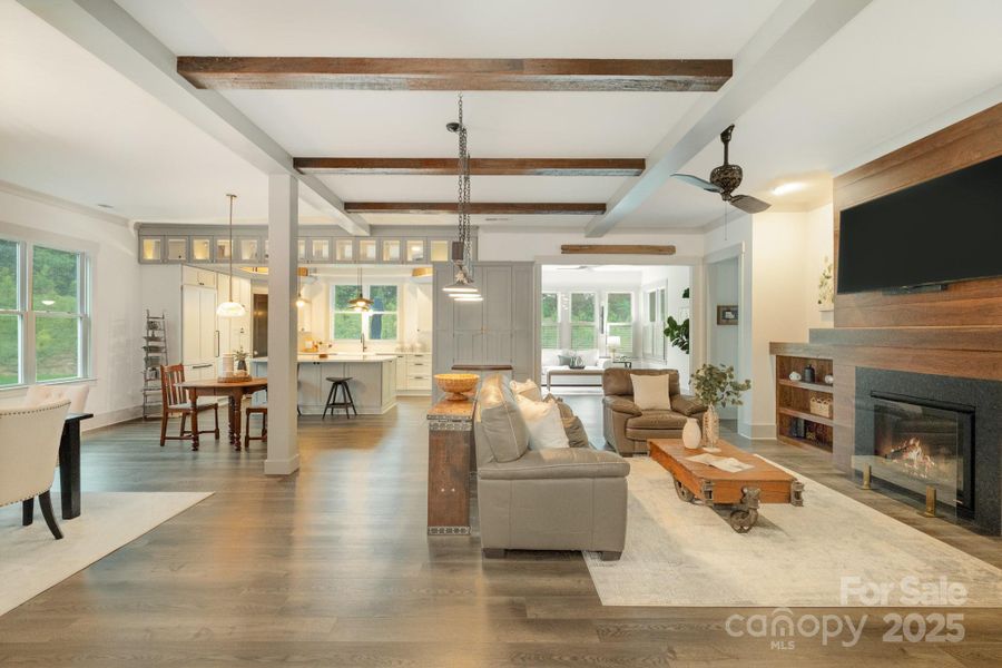 Enter into the heart of the home, a stunning space with custom details including reclaimed wood beams on the ceiling, walnut millwork and fantastic custom cabinetry. Enter into the heart of the home, a stunning space with custom details including reclaimed wood beams on the ceiling, walnut millwork and fantastic custom cabinetry.