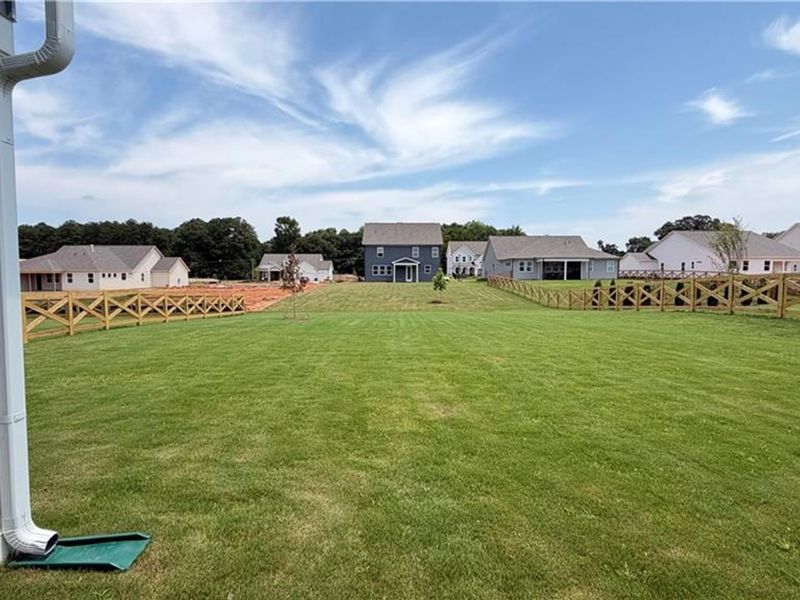 Exterior details and patio area of a home in Wehunt Meadows, Hoschton (Image 21).