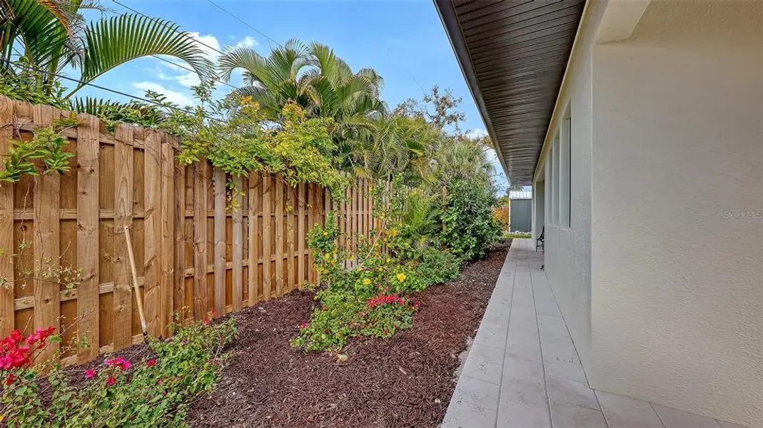 Exterior details and patio area of a home in , Sarasota (Image 21).