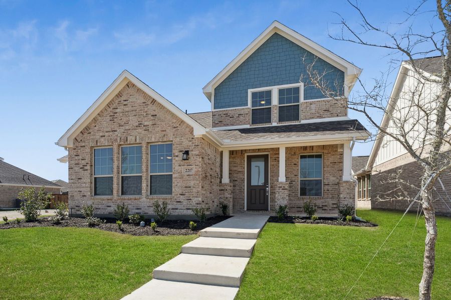 Front exterior of a new home in Dove Hollow, Waxahachie, TX, highlighting curb appeal (Image 17). Front exterior of a new home in Dove Hollow, Waxahachie, TX, highlighting curb appeal (Image 17).