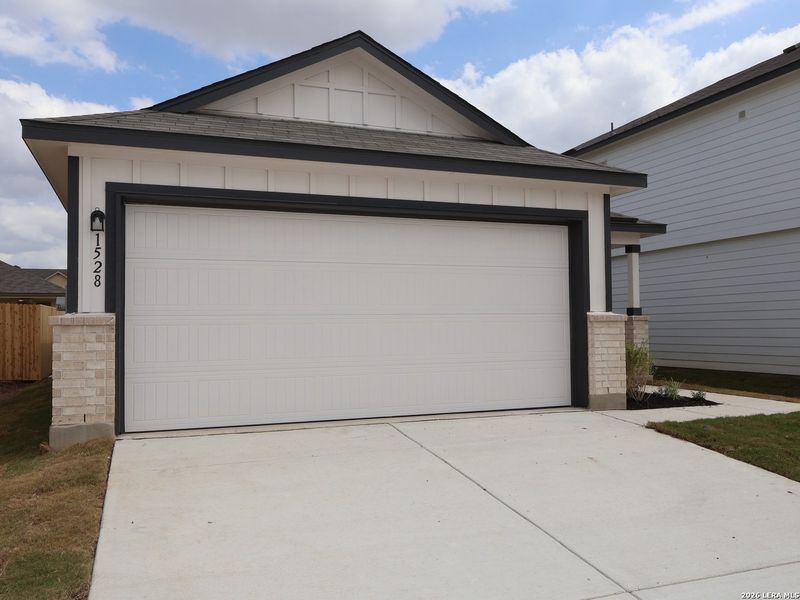 Front exterior of a new home in Meadows at Clear Springs, New Braunfels, TX, highlighting curb appeal (Image 20).