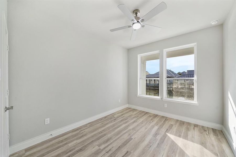 2nd bedroom- 1st floor & provides a canal view!