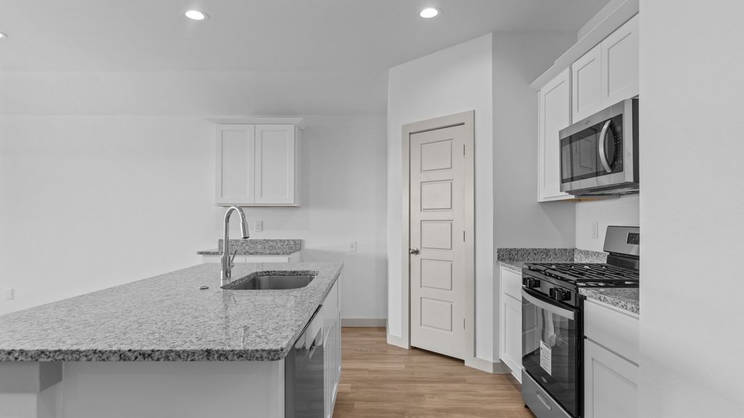 Representative furnished interior of a home built from the The Justin by D.R. Horton in Allen Farms, Lubbock (Image 10).