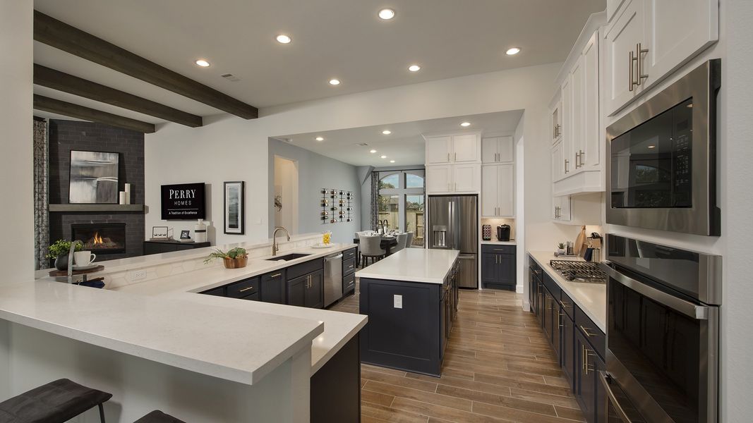 Representative furnished interior of a home built from the 3578W by Perry Homes in Lakes of Cane Island, Katy (Image 41).