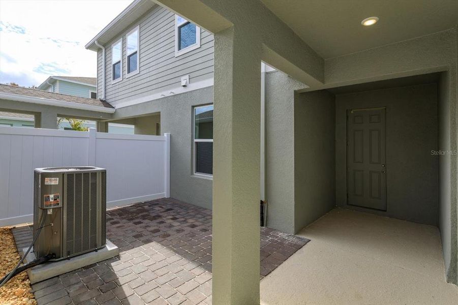 Exterior details and patio area of a home in Serenade at Ovation, Winter Garden (Image 3).