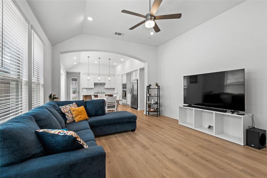 The space flows seamlessly into a contemporary kitchen and dining area, perfect for entertaining. The space flows seamlessly into a contemporary kitchen and dining area, perfect for entertaining.