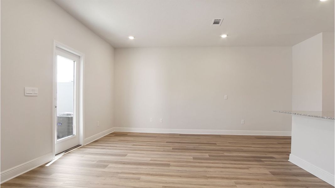 Representative unfurnished interior of a home built from the Palm Interior by D.R. Horton in Caballeros Estates Townhomes at Hombre, Panama City Beach (Image 23). Representative unfurnished interior of a home built from the Palm Interior by D.R. Horton in Caballeros Estates Townhomes at Hombre, Panama City Beach (Image 23).