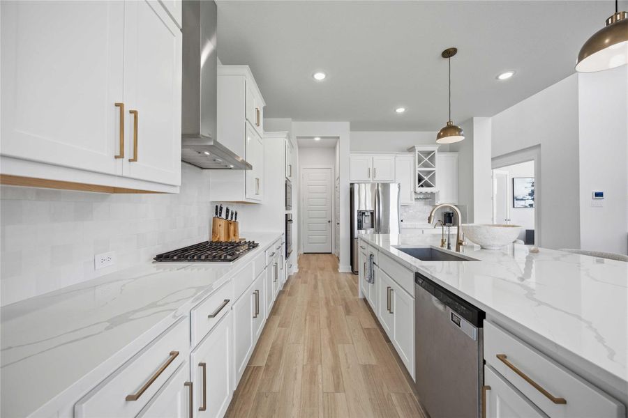 The heart of the home—where thoughtful design, elevated finishes, and effortless functionality create an unforgettable gathering space.