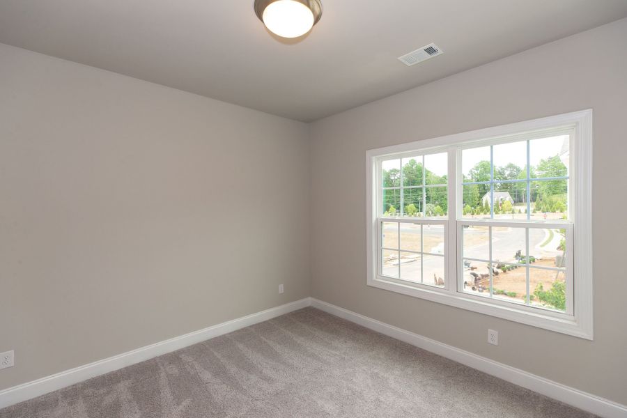 Representative unfurnished interior of a home built from the The Charleston by The Providence Group in Aberdeen, Hoschton (Image 43).