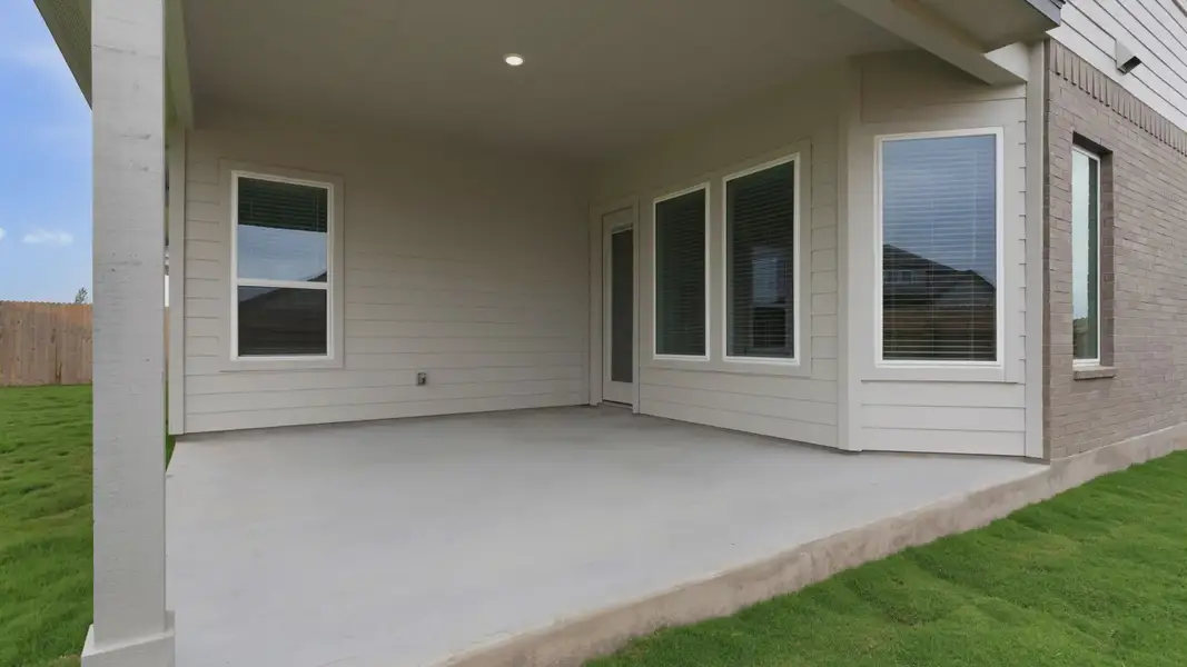 Exterior details and patio area of a home in The Grove at Blackhawk, Pflugerville (Image 3). Exterior details and patio area of a home in The Grove at Blackhawk, Pflugerville (Image 3).