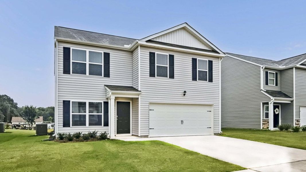 Front exterior of a new home in Wilson's Ridge, Wilson's Mills, NC, highlighting curb appeal (Image 17).