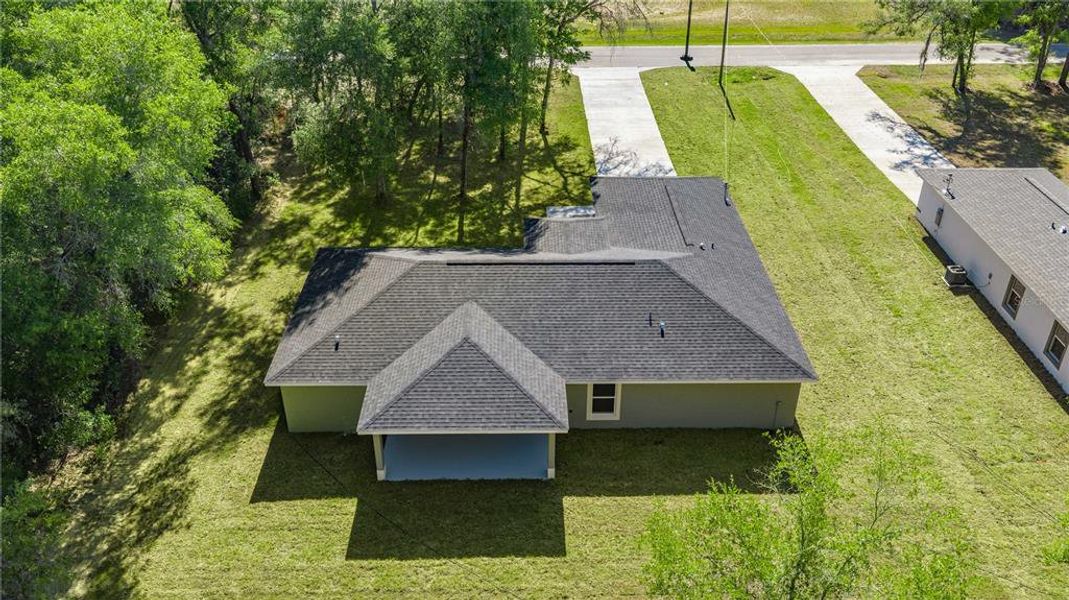 Front exterior of a new home in , Dunnellon, FL, highlighting curb appeal (Image 17).