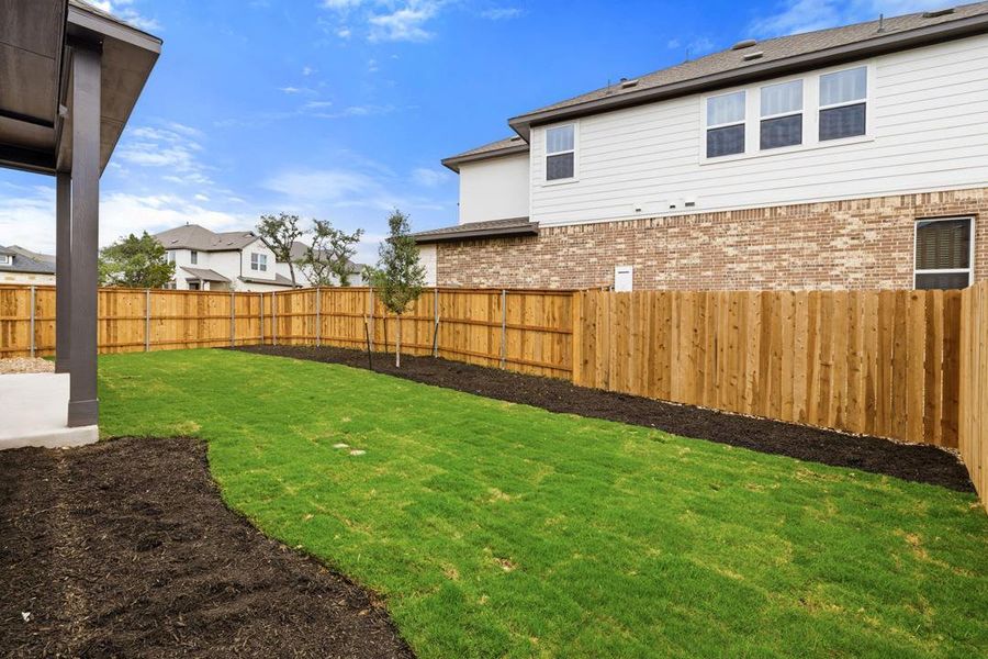 Exterior details and patio area of a home in Heritage, Dripping Springs (Image 25).