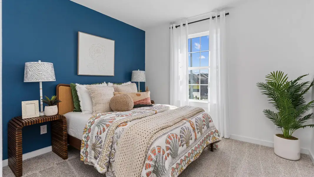 Furnished interior view inside a new home in Caldwell Crossing, Iowa Colony (Image 14).