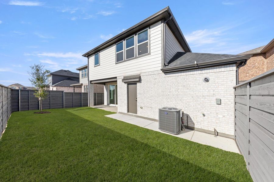 Exterior details and patio area of a home in Garden Collection at Union Park, Little Elm (Image 18). Exterior details and patio area of a home in Garden Collection at Union Park, Little Elm (Image 18).