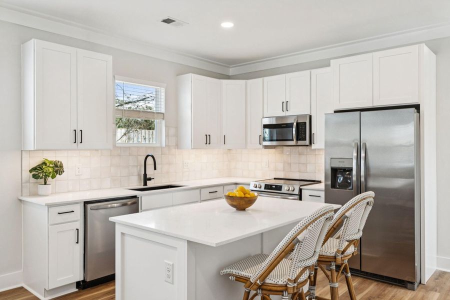 Furnished interior view inside a new home in , North Charleston (Image 17).