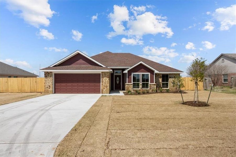 Front exterior of a new home in , Whitney, TX, highlighting curb appeal (Image 2). Front exterior of a new home in , Whitney, TX, highlighting curb appeal (Image 2).