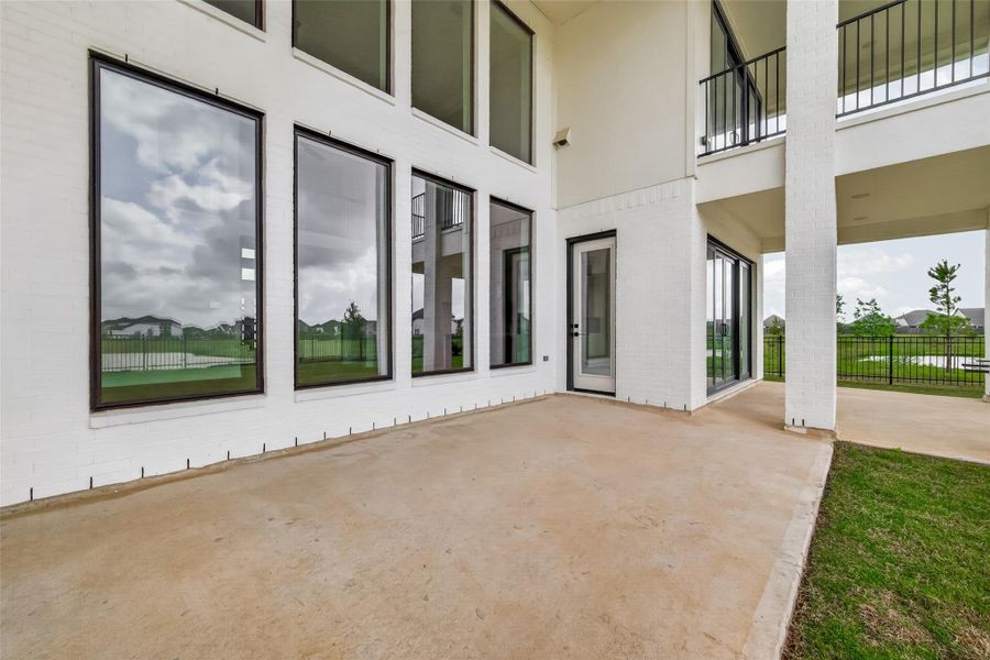 Exterior details and patio area of a home in , Brookshire (Image 27).