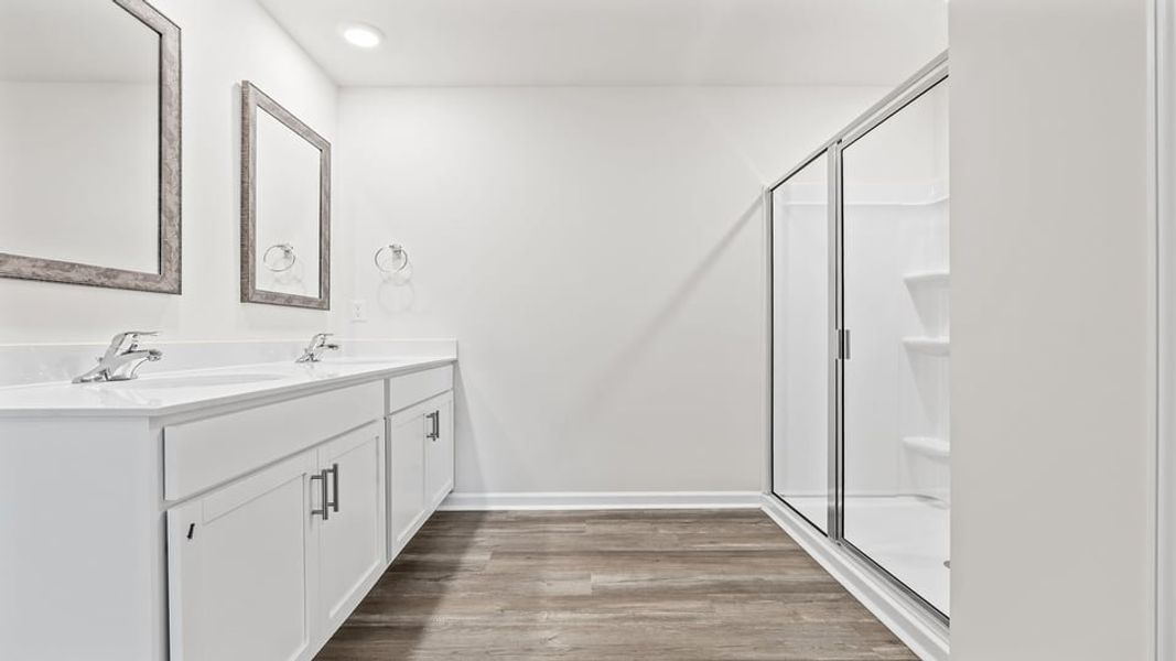 Furnished interior view inside a new home in Lakestone, Woodruff (Image 12).