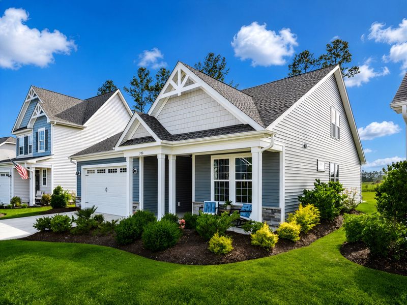 Representative exterior photo of a completed home built from the The Cherry Grove by Chesapeake Homes in Heritage Park at Longs, Longs, SC (Image 26).