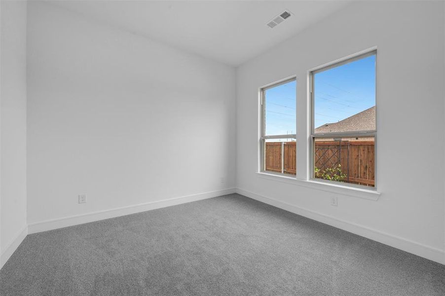 Spacious, unfurnished interior of a new home in Wellington, Haslet (Image 27).