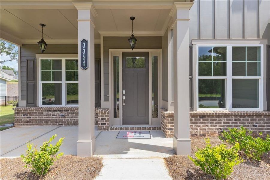 Exterior details and patio area of a home in Traditions of Braselton, Jefferson (Image 2).