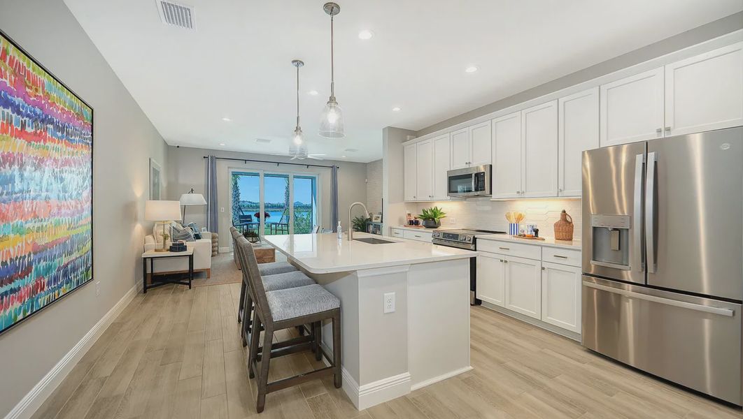 Representative furnished interior of a home built from the Avery by Neal Communities in SkySail, Naples (Image 16).